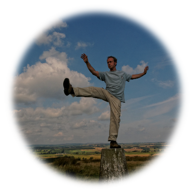 photo of Dave in the hills balancing upon a pillar doing Tai Chi